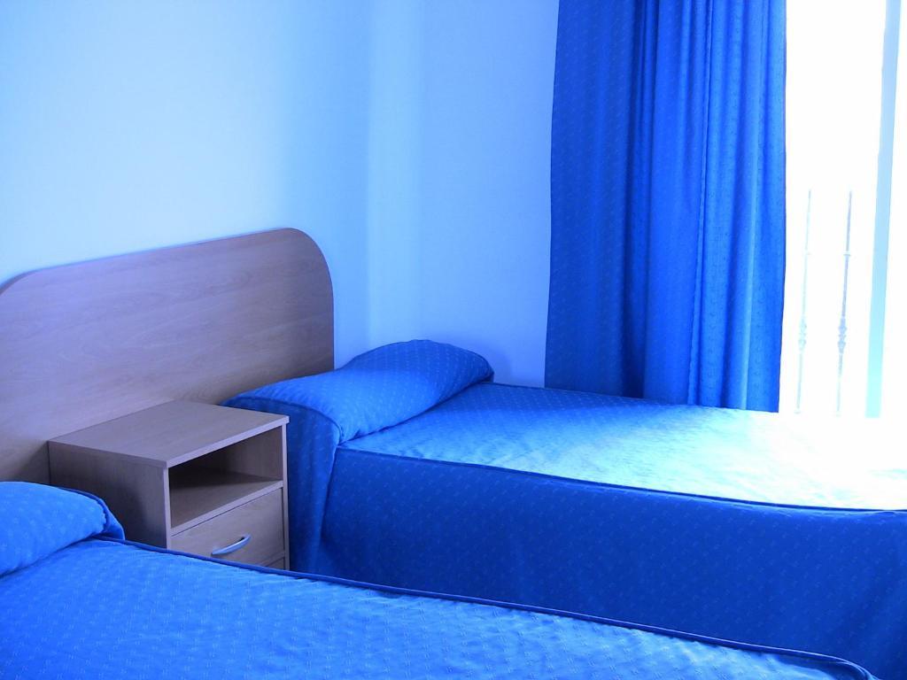 Apartahotel Los Hermanos Оканья Номер фото