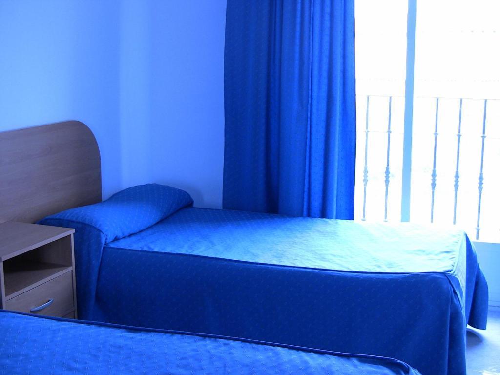 Apartahotel Los Hermanos Оканья Номер фото