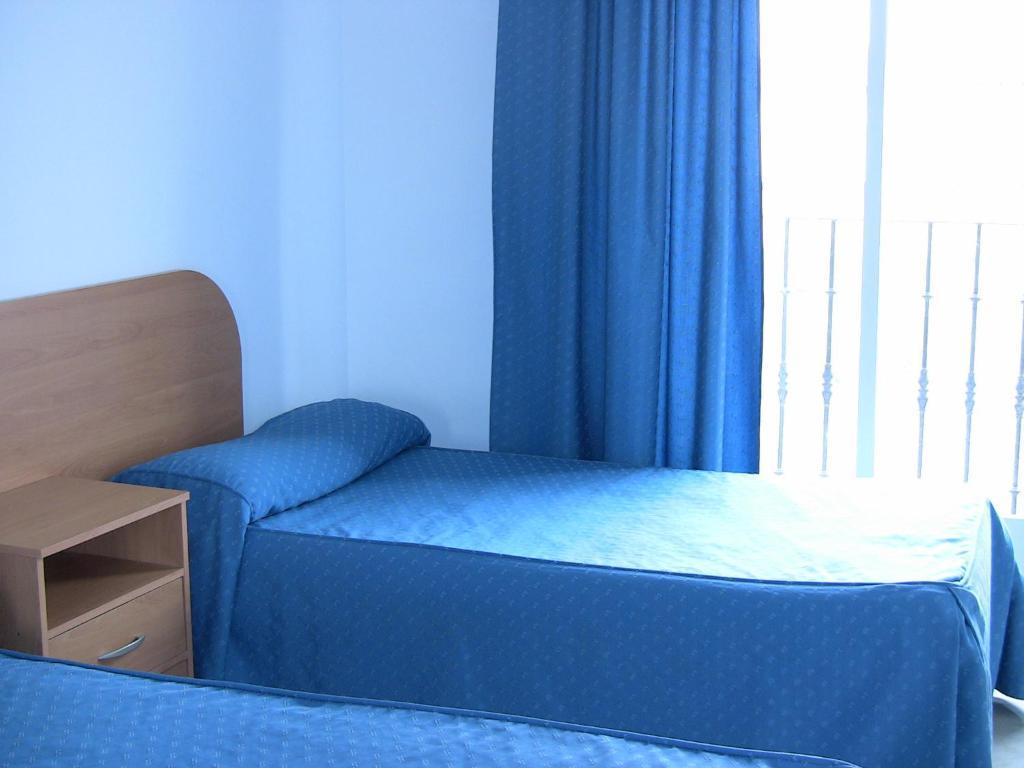 Apartahotel Los Hermanos Оканья Номер фото
