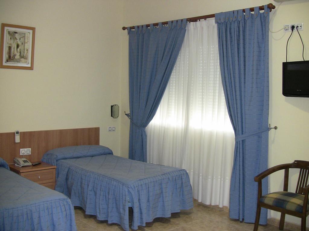 Apartahotel Los Hermanos Оканья Экстерьер фото